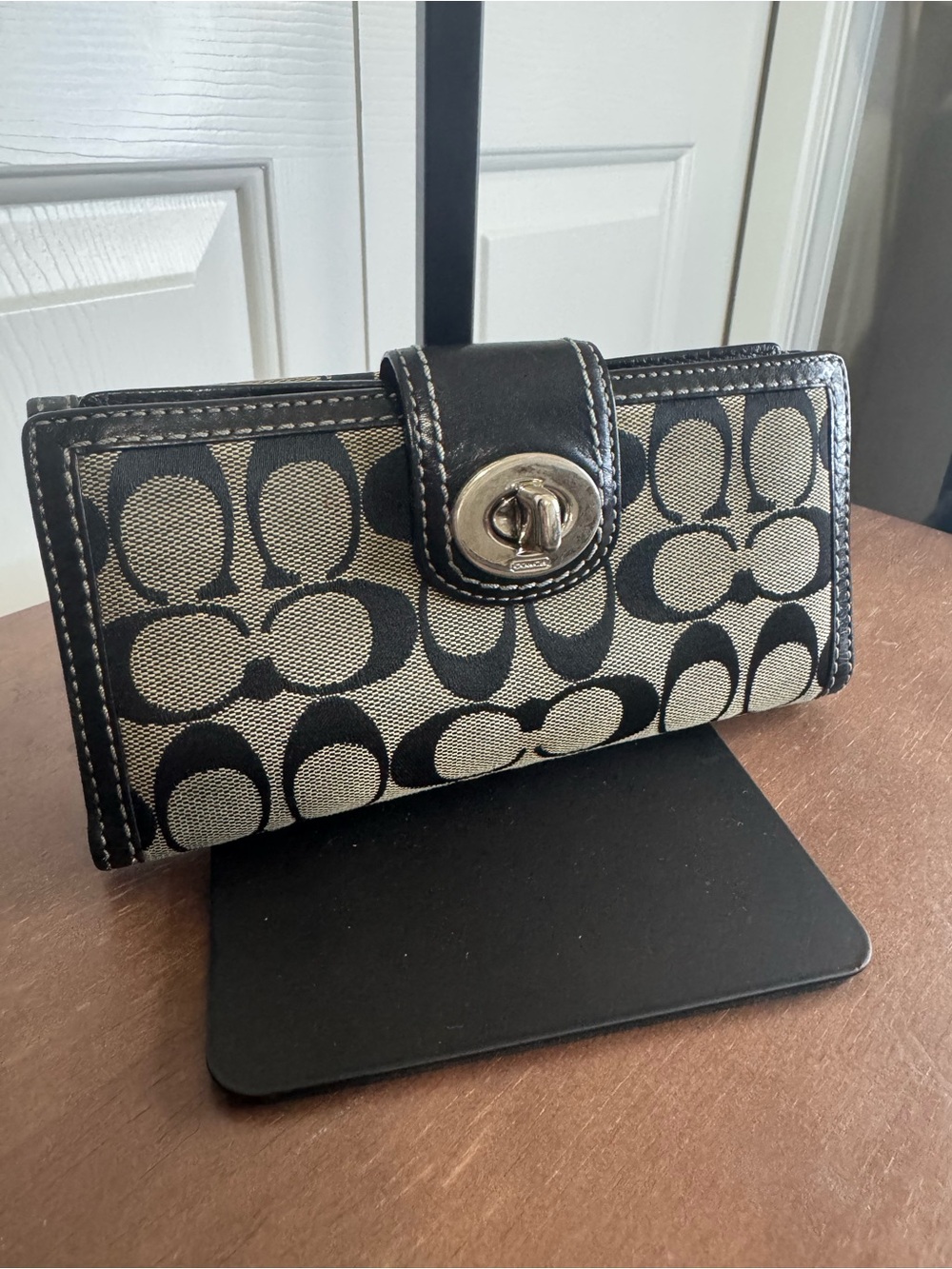 Coach Black and Beige Signature Canvas Turnlock Wallet